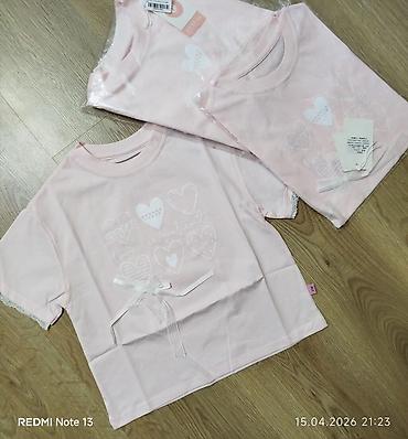 Dəstlər: Uşaq geyim dəstləri 1) Krem rəngli 2 hissəli dəst: - Qolsuz jilet — 3