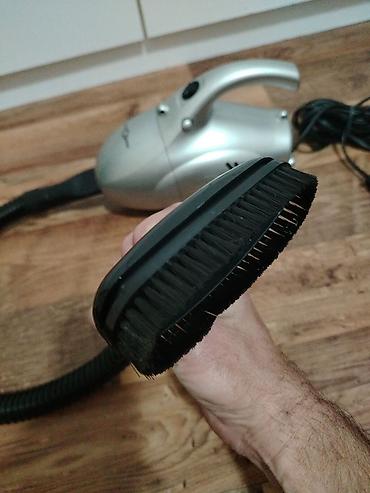 Ručni usisivači: Ručni električni usisivač – Candy Star (mrežni, sa dodacima) Opis: - — 5