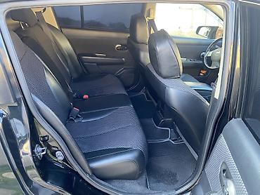 bmw e 39: Nissan Tiida, qara rəng, hetçbek gövdə. - Güclü və qənaətcil benzin — 6