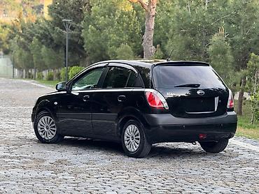 Kia: Kia Rio hatchback Xarici görünüş: - Rəng: qara - 5 qapılı hatchback — 3