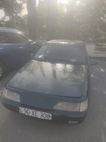 Şarj cihazları: Maşın: Daewoo Espero, sedan kuzov (nömrə nişanı: AZ 90-XE-308). Rəng