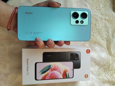 fotosnaiper fs 12: Xiaomi Redmi Note 12, 8 GB, цвет - Голубой, 
 Отпечаток пальца, Две SIM карты, Face ID