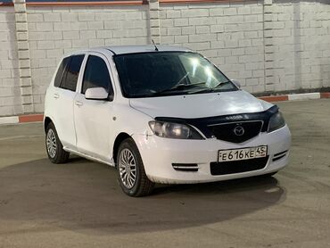 суппорт тормозной передний: Mazda Demio: 2003 г., 1.3 л, Автомат, Бензин