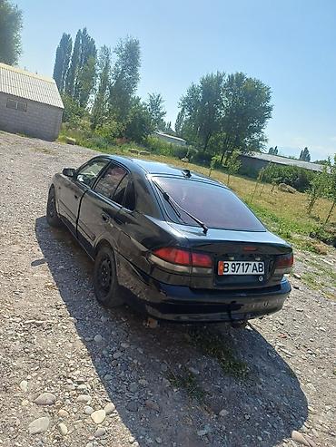 комбин: Mazda 626: 2000 г., 1.8 л, Механика, Бензин, Седан — 2