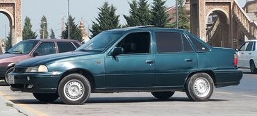 əzilmiş maşınlar: Daewoo Nexia: 1.5 l | 1998 il Sedan