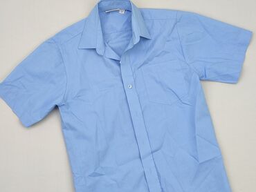 koszula czarno biala: Koszula 16 lat, stan - Idealny, wzór - Jednolity kolor, kolor - Błękitny