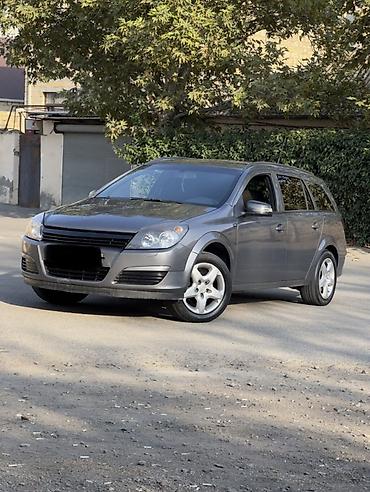 mesok satisi: Opel Astra H Caravan (universal) – boz rəngdə, 5 qapılı — 2