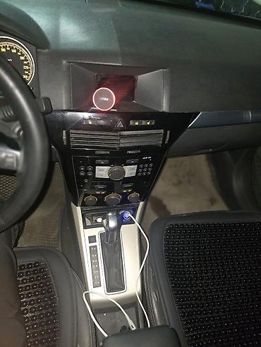 lada 06: Opel Astra: 2008 г., 1.8 л, Автомат, Газ, Универсал — 10