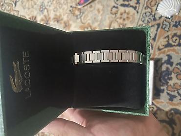 браслет лакосте: Браслет Lacoste в фирменной подарочной упаковке. - Материал: металл — 4