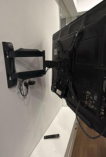 Установка телевизоров: Кронштейн для телевизора поворотно-наклонный от32до65дюймов ( продажа — 2