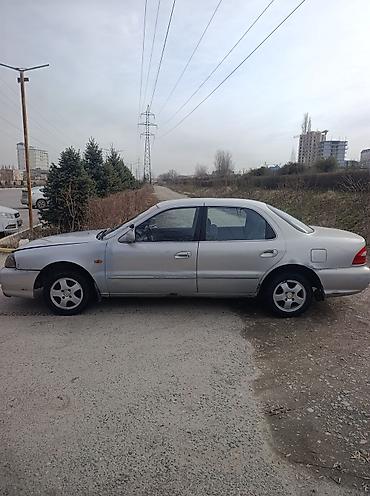 Kia: Kia Clarus: 1999 г., Механика, Седан — 2