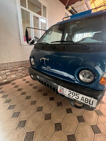 электро ускутер: Грузовик Hyundai Porter синего цвета. Эта модель оснащена
