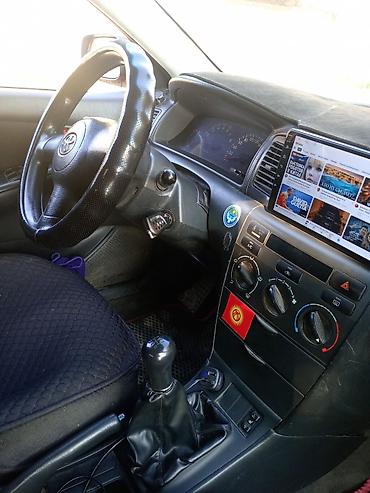 Унаа: Toyota Corolla: 2004 г., 1.8 л, Кол менен иштөөчү, Бензин, Хетчбек — 9
