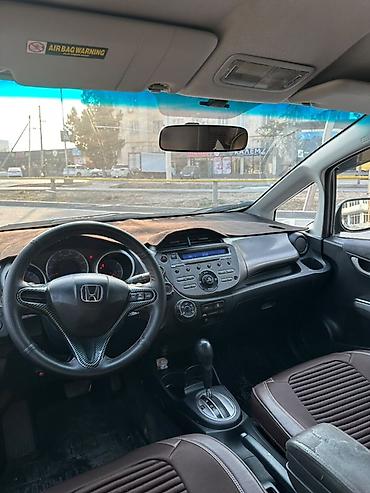 самое бортовой: Honda Fit: 2009 г., 1.5 л, Автомат, Бензин, Хэтчбэк — 4