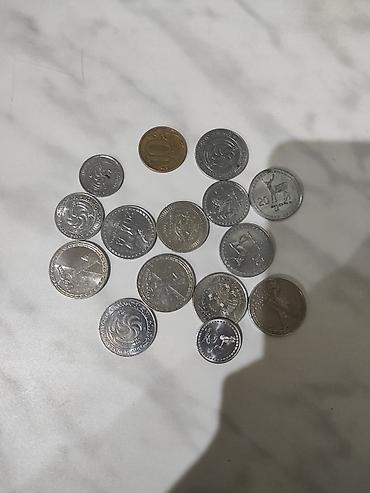 Gürcüstan milli valyutası – larinin xırda pulları toplusu. Məzmun: -