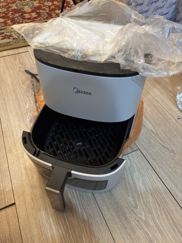 продаю аэрогриль: Аэрогриль новый, ни разу не использовался.(большое количество функций