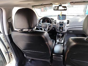 Kia: Kia Forte: 1.6 l | 2011 il Sedan — 8