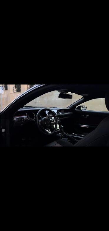 Ford: Model: Ford Mustang GT, kupe, 2 qapı Rəng: Tünd boz (metallic) Nömrə — 5