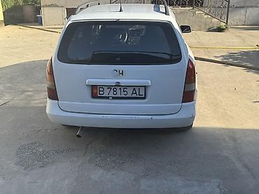 range over: Opel Astra: 2001 г., Универсал — 4