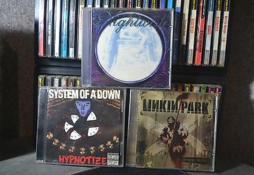 CD, DVD диски: Музыкальные аудио-CD (rock/metal). Б/у и неоткрытые, в пленке — 1