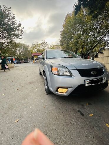 фольксваген тигуан дизель: Kia Rio: 1.5 л | 2010 г. Седан