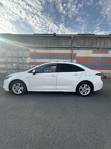 купить витц: Toyota Corolla: 2022 г., 1.8 л, Вариатор, Гибрид, Седан — 4