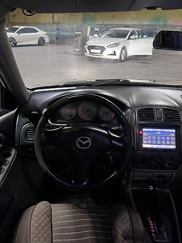 mazda 323 машина: Mazda 323: 2003 г., 1.6 л, Автомат, Бензин, Хэтчбэк — 8