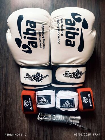 Boks aparatları: 14 oz aiba əlcək (dəri deyil) və 5 metrlik elastik adidas sarğı yeni lalafo.az -da Boks aparatları: 14 oz aiba əlcək (dəri deyil) və 5 metrlik elastik adidas sarğı yeni