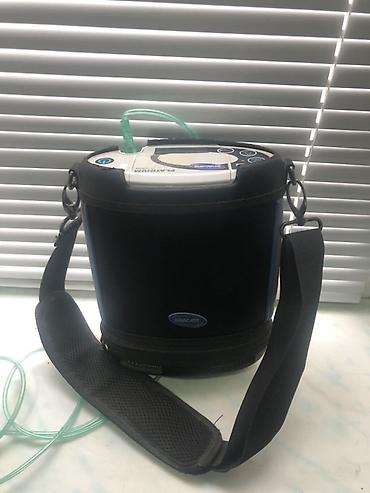 tibb geyimi: Invacare Platinum Mobile portativ oksigen konsentratoru - Model — 1