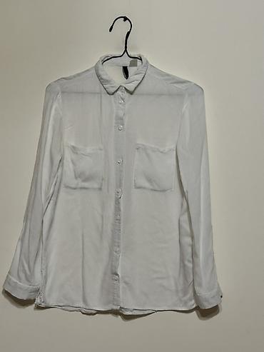 Köynək və bluzalar: H&M Ağ rəngli qadın köynəyi: - Klassik düz kəsim, uzunqol; - Ön — 1