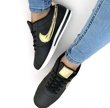 air green: Ženske patike Nike Cortez u crno-zlatnoj kombinaciji. Karakteristike — 1