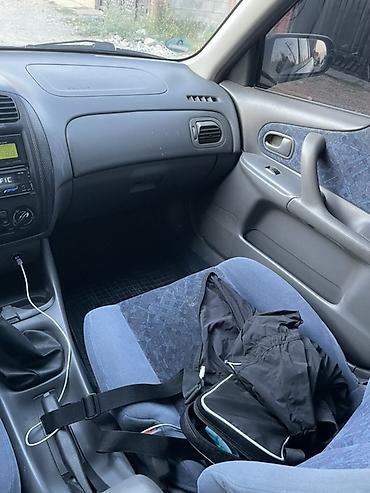 машинка б у: Mazda 323: 1999 г., 1.6 л, Механика, Бензин, Седан — 6