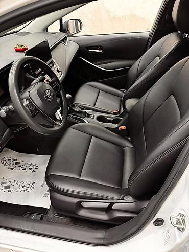 byd ev: Toyota Corolla: 2024 г., 1.8 л, Вариатор, Гибрид, Седан — 7