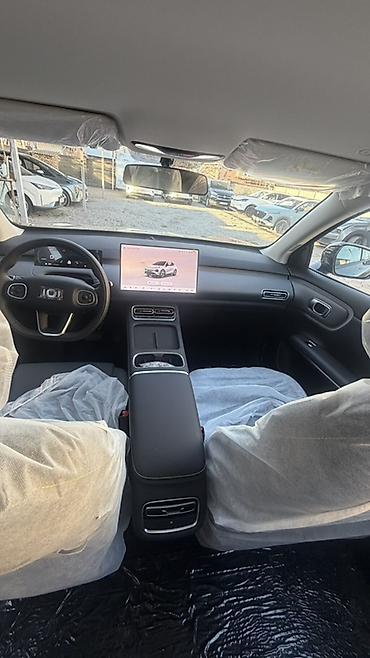 Другой электротранспорт: Электромобиль crossover сегмента C. Основные характеристики по фото — 7