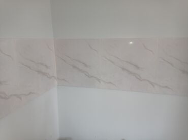 Plitə işləri: Kafelmetlax .keramogranit işləri .və stajka işi görülür — 2