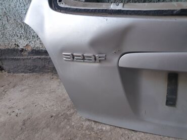 бампер ваз 2114: Багажниктин капкагы Mazda