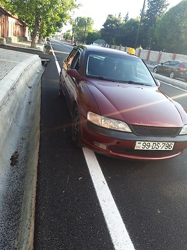 opel ehtiyat hisələri: Opel Vectra sedan – vişnə rəngi, 4 qapı, qara disklər, tonlu şüşələr — 8