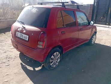 нарын машина: Daihatsu Cuore: 2003 г., 1 л, Механика, Бензин