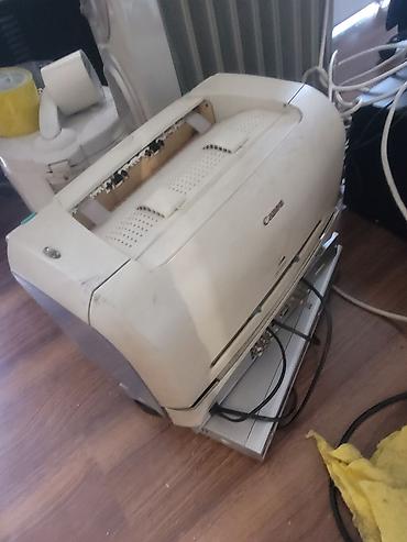 Принтеры: Лазерный принтер Canon. Настольный принтер в корпусе светлого цвета — 1