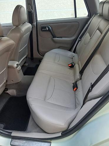амыватель: Nissan Primera: 2001 г., 2 л, Автомат, Бензин, Универсал — 7