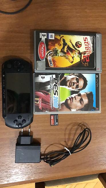 PSP (Sony PlayStation Portable): Orginal batarya,zaryadka,yaddaş kartı İşlek problemsiz içi oyunlu — 1