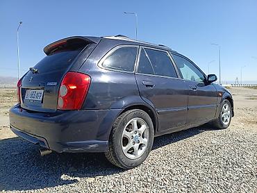 бишкек авто салон: Mazda 323: 2002 г., 2 л, Автомат, Бензин, Хетчбек — 4