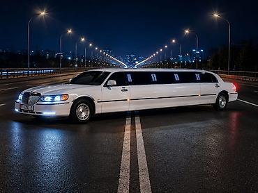 70 200: Лимузин Lincoln Town Car Stretch — представительский белый седан — 2
