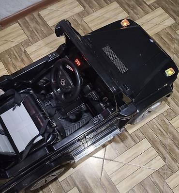 elektro muravey: Uşaq üçün elektrikli minik maşını – qara rəngdə, SUV/G-Class üslublu — 1