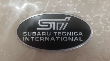 taksi nişanı: Subaru STI emblemi