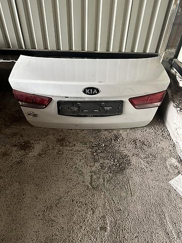 Крышка багажника KIA Rio (седан), белая. - Оригинальная деталь с