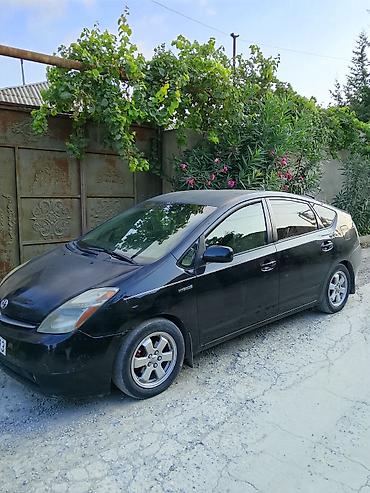 prius diskləri: Toyota Prius, 2-ci nəsil, hibrid. - Kuzov: hetçbek, qara rəng - Güc — 2
