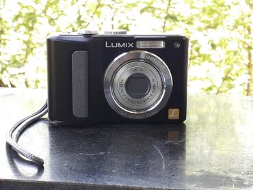пленочные фотоаппараты: Панасоник LZ-8, Leica объектив, работает от 2-х пальчиковых батареек