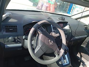 Opel: Opel Zafira, gümüşü rəng, 7 yerlik (3 cərgə oturacaq) minivan — 11