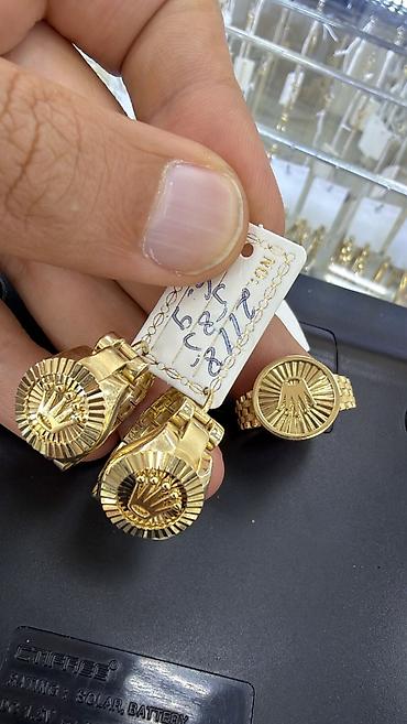 Dəstə daxildir: Üzük, Sırğa, Sarı qızıl, 585 Əyar, 9 g